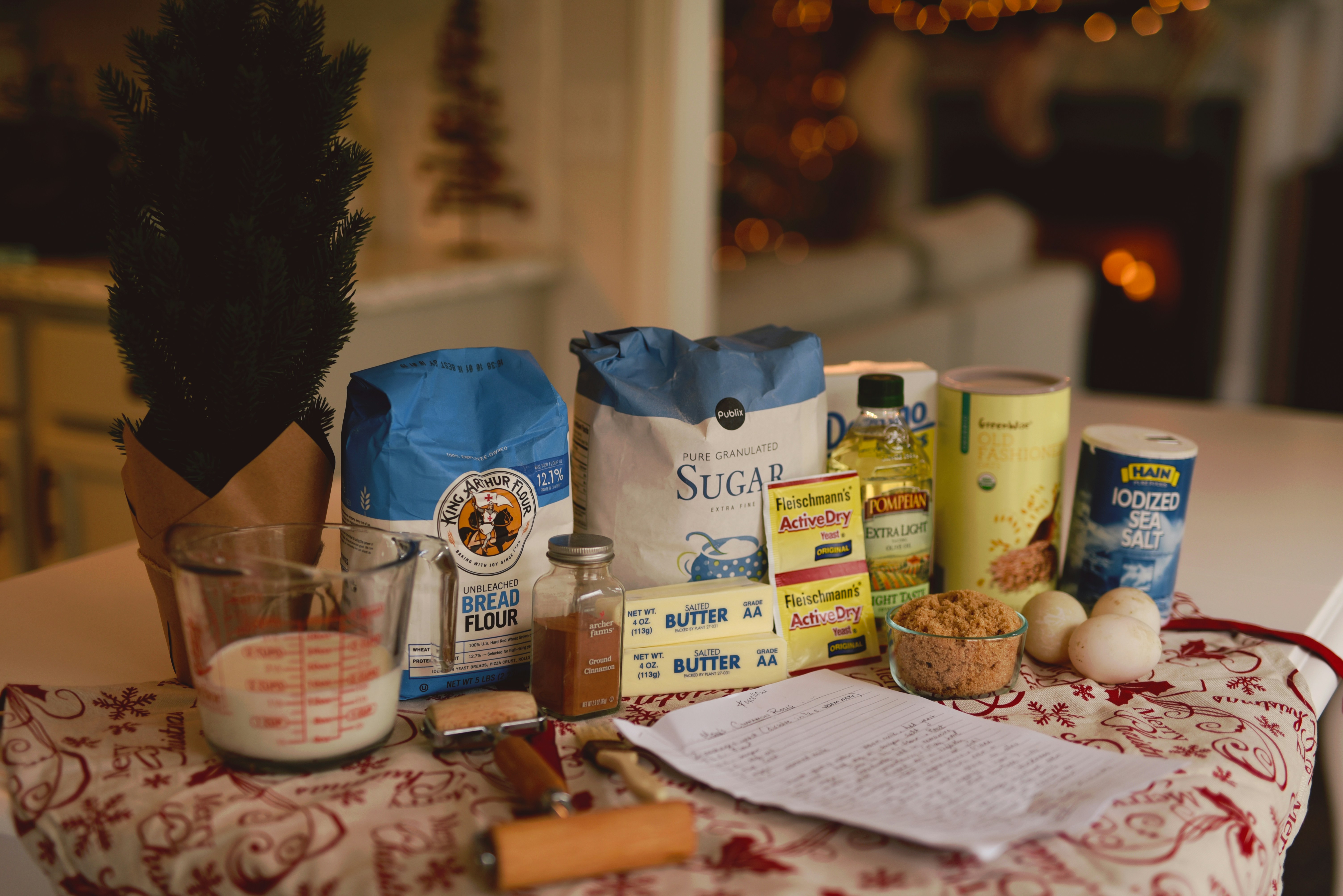 Assorted baking ingredients laid out on a kitchen table