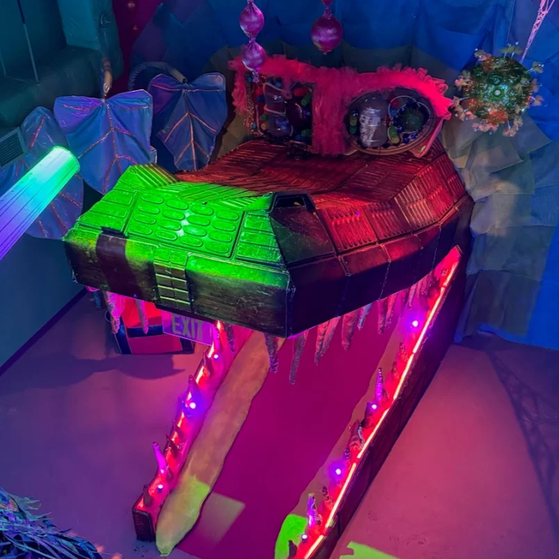 Colourful alligator-shaped entrance exhibit at JAMNOLA